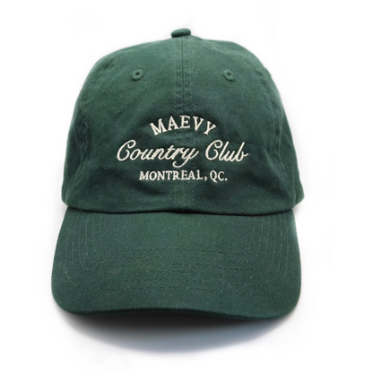 Dark green baseball cap with embroidered white writing that says "Maevy Country Club, Montreal, Quebec"